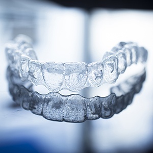 Clear Invisalign tray on table